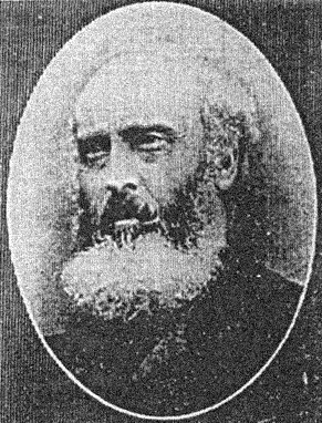 Black and white image of older man’s face and shoulders, balding with white bushy beard. Caption in image reads: Sir Stephen De Vere, Elder Brother of the Poet.