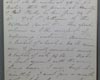 Handwritten diary entries in reddish brown ink on grey page.