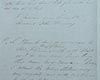 Lettre manuscrite à l’encre noire, sur papier blanc aux tons de gris.