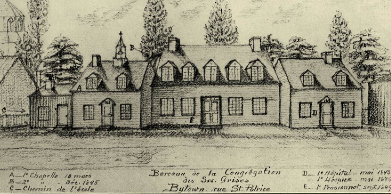 Black and white illustration, front profile of three adjoining two storey buildings, gabled windows on second storey, steeple on left building, with attached outbuilding, partial view of large church and trees in background.